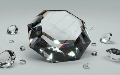 Wielki, błyszczący diament otoczony mniejszymi kamieniami. To właśnie co to diament – symbol luksusu i piękna, odbijający światło.